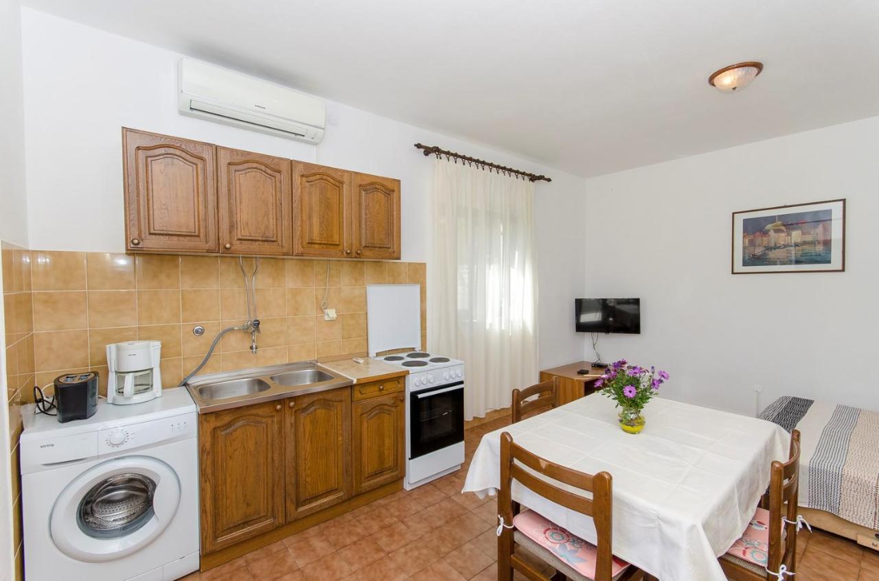 Apartments Goran Постира Экстерьер фото