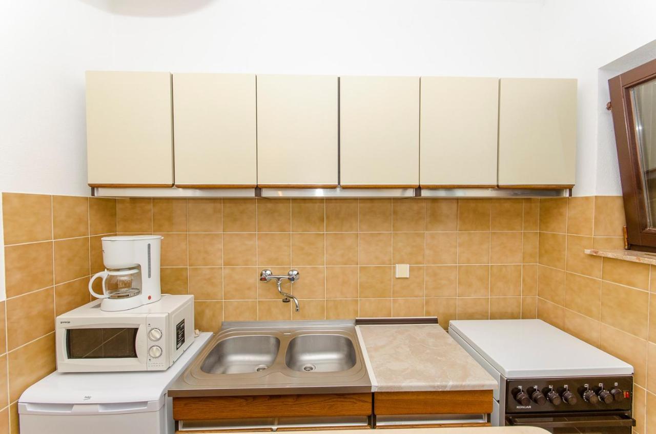 Apartments Goran Постира Экстерьер фото