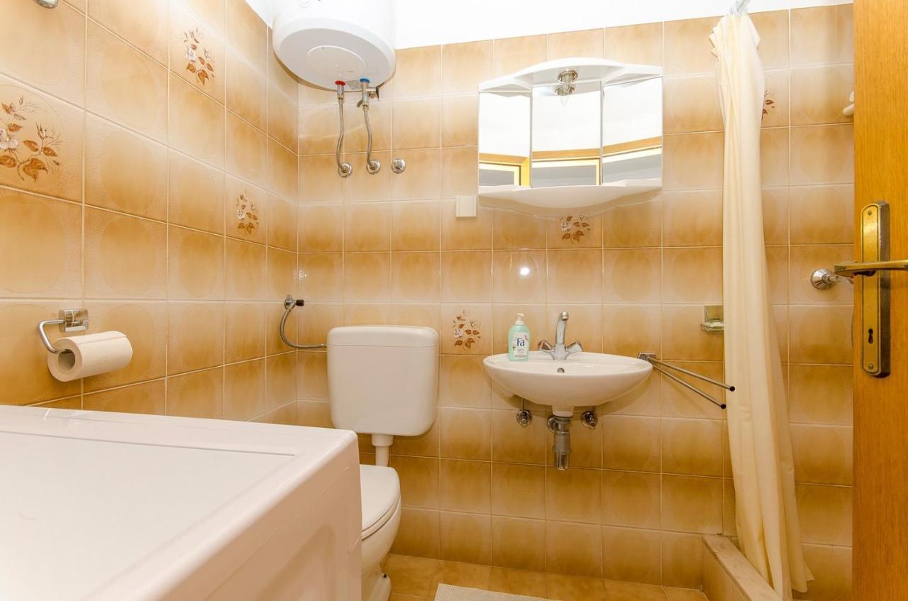 Apartments Goran Постира Экстерьер фото