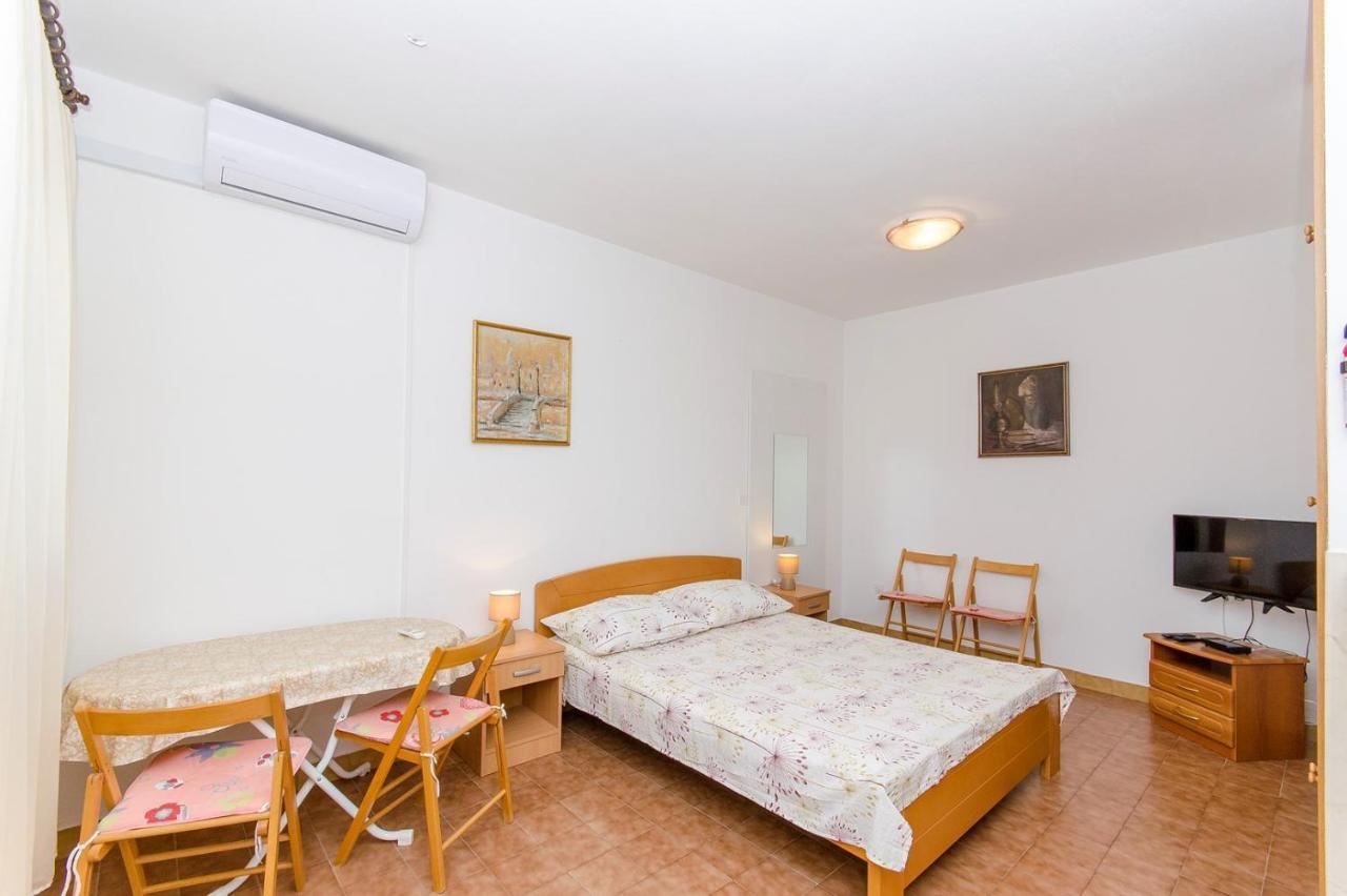 Apartments Goran Постира Экстерьер фото