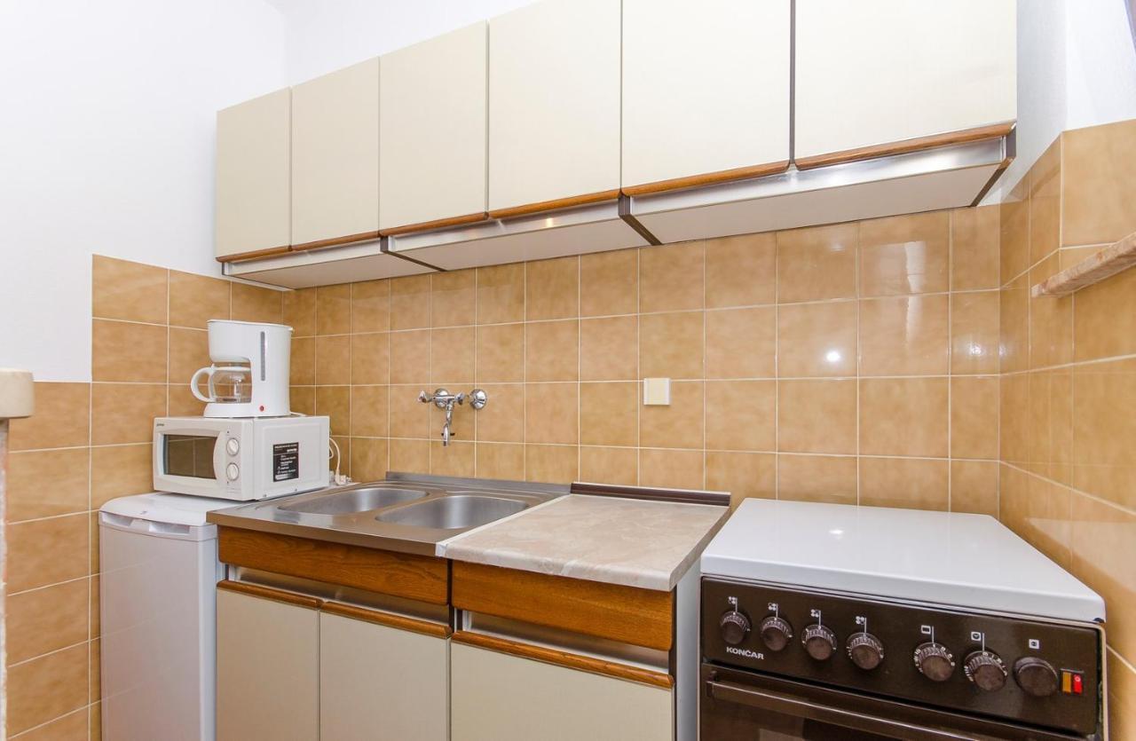 Apartments Goran Постира Экстерьер фото